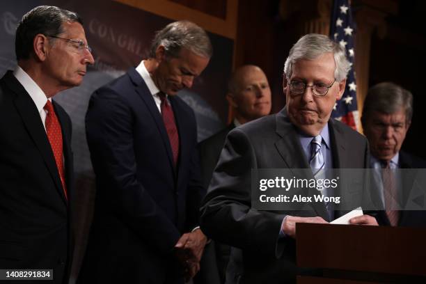 Senate Minority Leader Sen. Mitch McConnell speaks as Sen. John Barrasso , Senate Minority Whip Sen. John Thune , Sen. Rick Scott , and Sen. Roy...