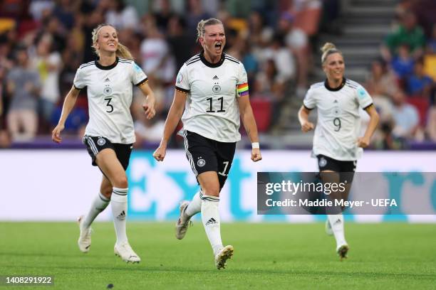 Alexandra Popp celebrates with Kathrin-Julia Hendrich of Germany after scoring their team's second goal during the UEFA Women's Euro 2022 group B...