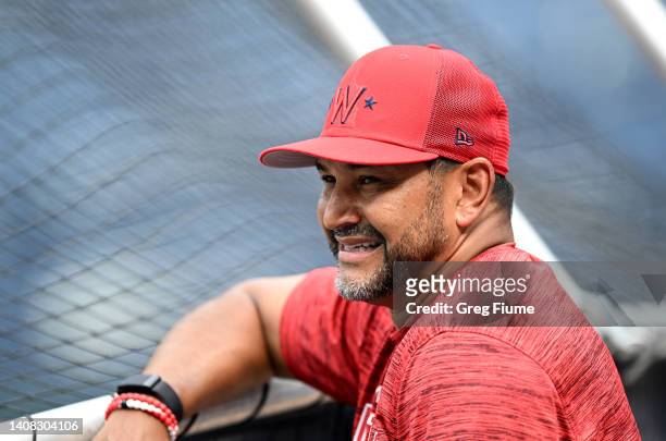 Manager Dave Martinez of the Washington Nationals watches batting practice before the game against the Seattle Mariners at Nationals Park on July 12,...