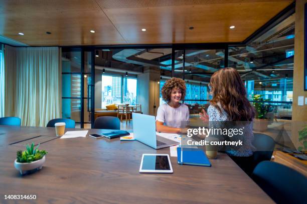 business colleagues having a conversation. - sales executive stock pictures, royalty-free photos & images