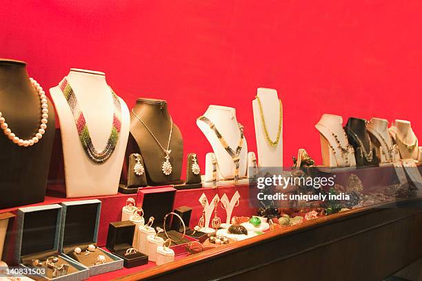 jewelry on display in a jewelry store, new delhi, india - new delhi gold stock pictures, royalty-free photos & images