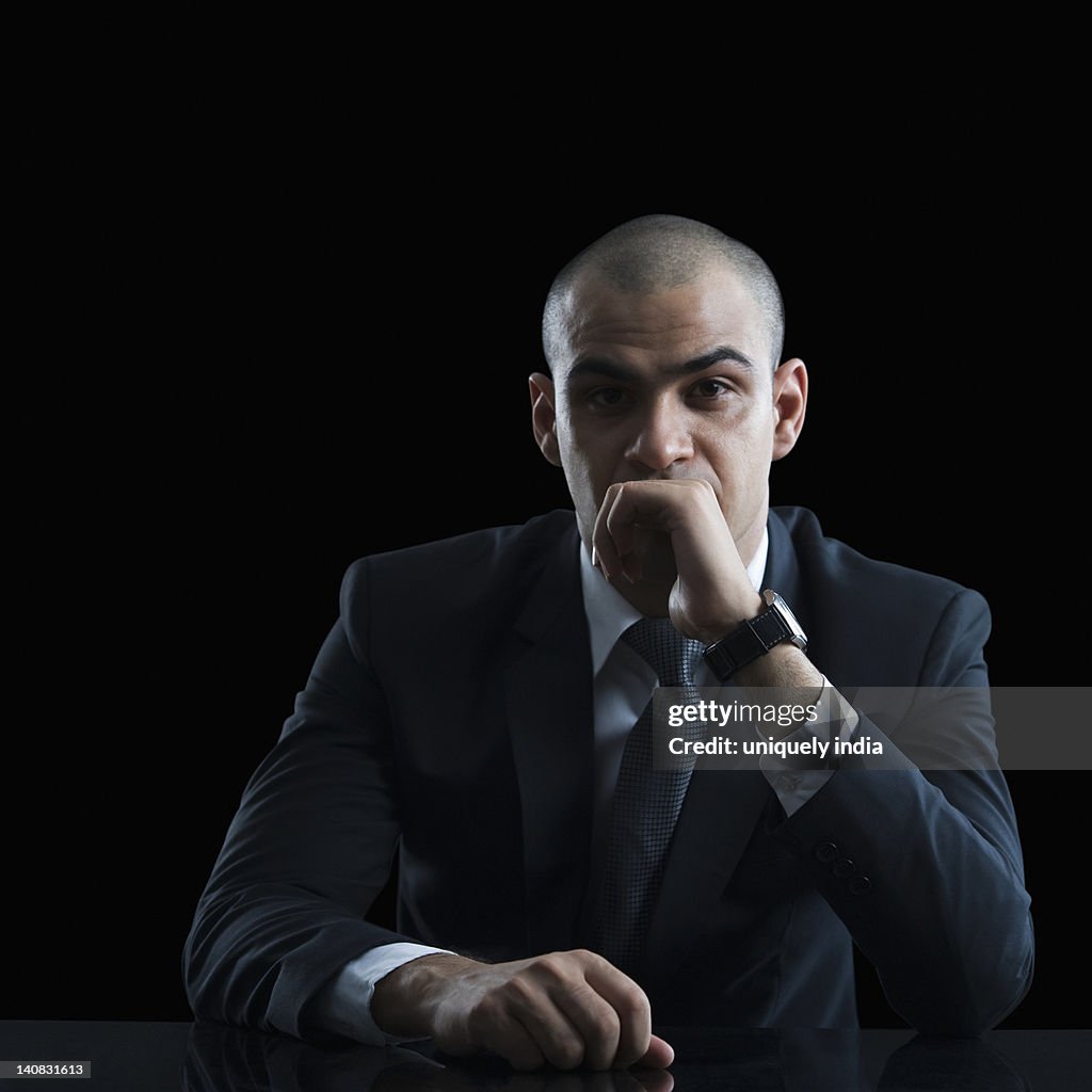 Portrait of a businessman thinking