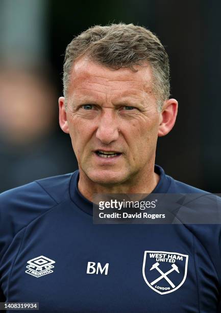 Billy McKinlay, the West Ham United first team coach looks on during the pre season friendly match between Boreham Wood and West Ham United at Meadow...