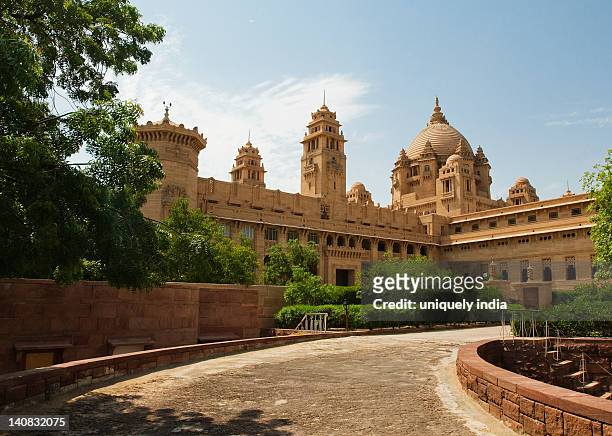 facade of a palace, umaid bhawan palace, jodhpur, rajasthan, india - palace stock pictures, royalty-free photos & images