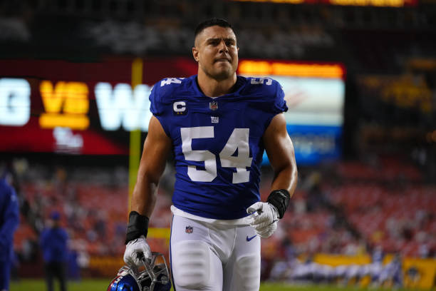 Blake Martinez of the New York Giants walks onto the field against the Washington Football Team prior to an NFL game at FedExField on September 16,...