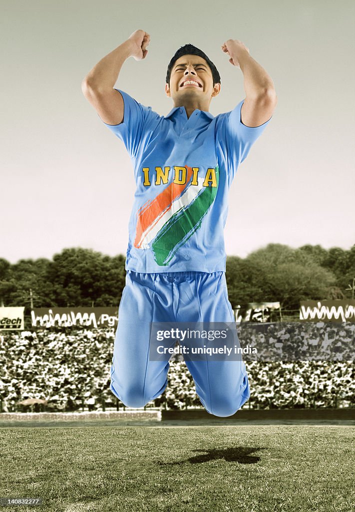 Cricket bowler celebrating his success in a stadium