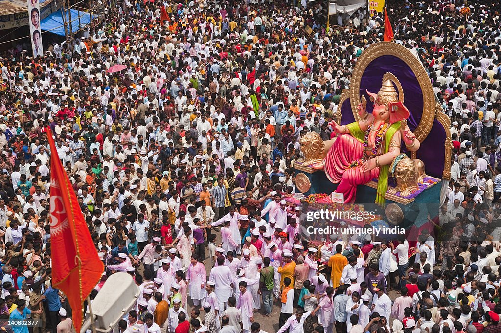 Crowd at religious procession during Ganpati visarjan ceremony, Mumbai, Maharashtra, India