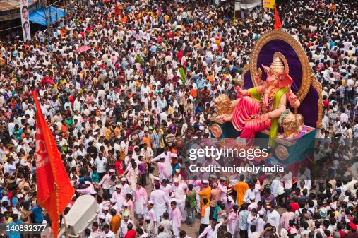 Crowd at religious procession during Ganpati visarjan ceremony, Mumbai, Maharashtra, India Crowd at religious procession during Ganpati visarjan ceremony, Mumbai, Maharashtra, India