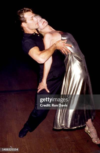 American actor, dancer, and singer-songwriter Patrick Swayze , dances with his wife, American writer, dancer, choreographer, actress, and director...