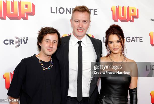 Nicholas Coombe, Kyle Newman, and Paris Berelc attend "1UP" Los Angeles Premiere at TCL Chinese 6 Theatres on July 12, 2022 in Hollywood, California.