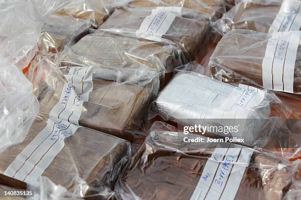 Packages containing confiscated cocaine are seen at a press conference on March 4, 2012 in Hamburg, Germany. Agents seized 260 kg of cocaine aboard...