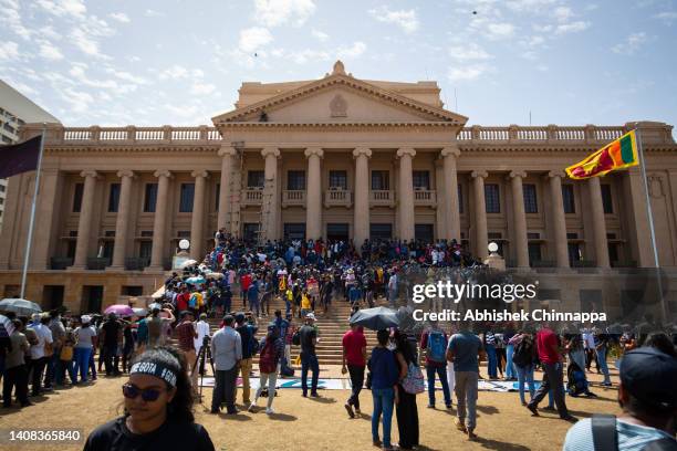 Protesters occupy the lawn of the Presidential Secretariat on July 13, 2022 in Colombo, Sri Lanka. Sri Lanka’s airforce has confirmed that President...