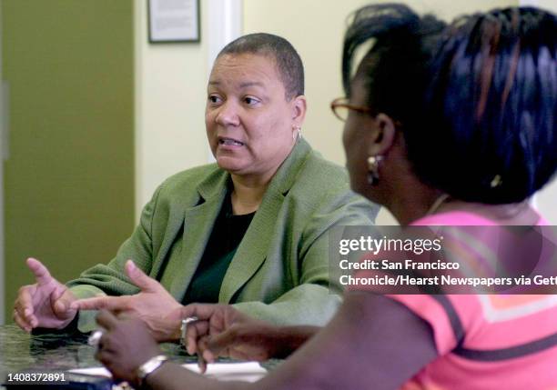Ebaids015_pc.jpg Executive Director Hazel Wesson conducted a meeting with staffers including Psychosocial Director Deborah Wyatt-O'Neal . AIDS...