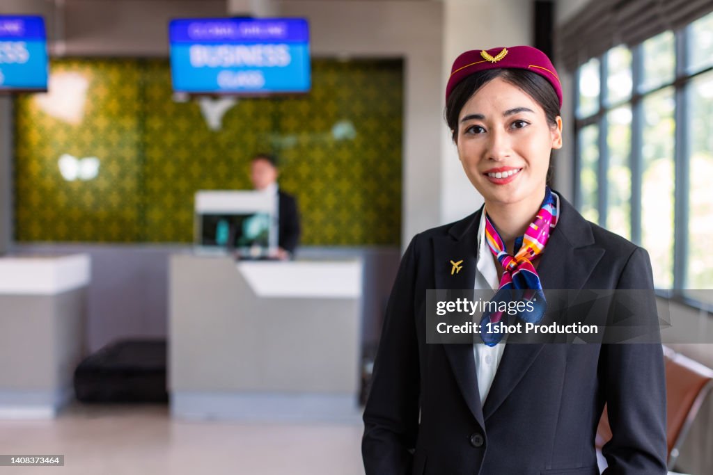 Crew Check In Portrait Of Smart Airline Cabin Crew With Checkin Counter In Background ...