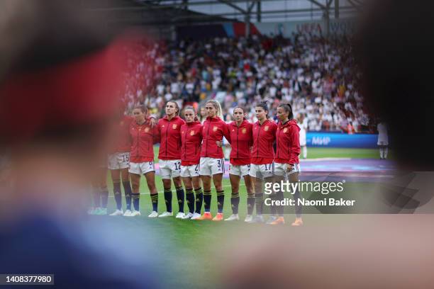 Team Spain line up for the national anthem during the UEFA Women's Euro England 2022 group B match between Germany and Spain at Brentford Community...