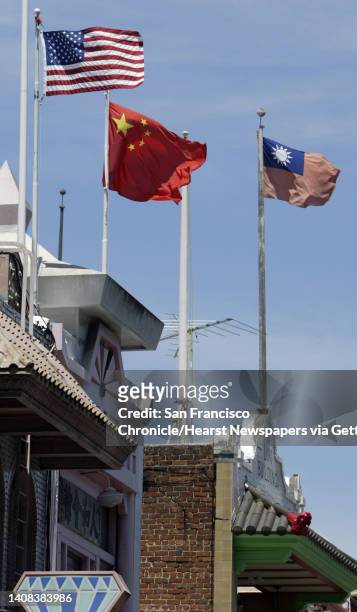 Chinatown_061_pc.jpg The national flags of the United States, China and Taiwan all fly side-by-side on rooftops high above Grant Ave. Taiwanese flags...