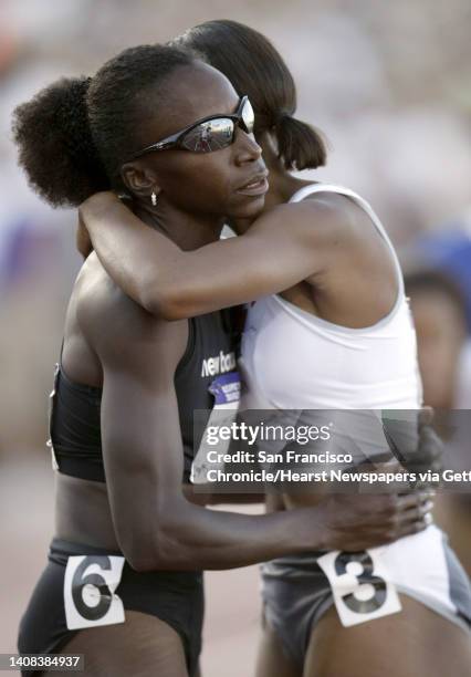 Olytrack13_068_pc.jpg Jearl Miles-Clark , winner in the Women's 800m run, hugs her sister Hazel Clark, who finished in 3rd place, after the race. Day...