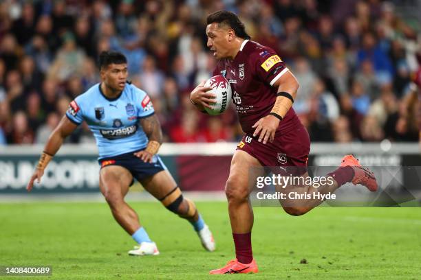 Josh Papalii of the Maroons runs the ball during game three of the State of Origin Series between the Queensland Maroons and the New South Wales...