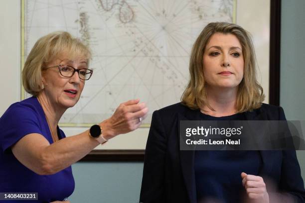 Conservative leadership candidate Penny Mordaunt and supporter Andrea Leadsom, listen to a question from the media during a press conference to...