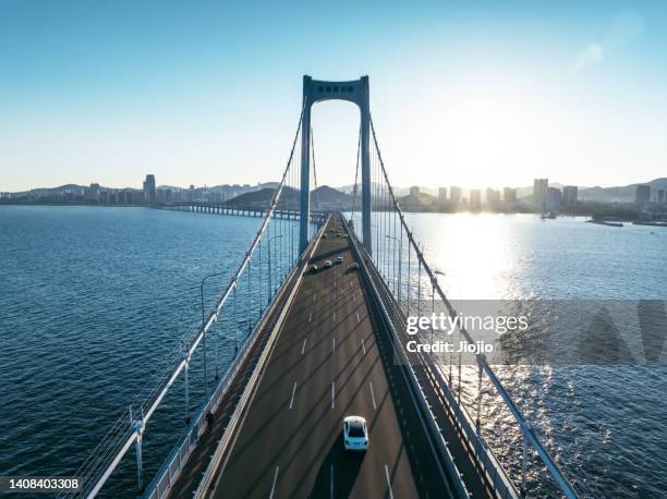 modern bridge and sea - car in driveway ストックフォトと画像