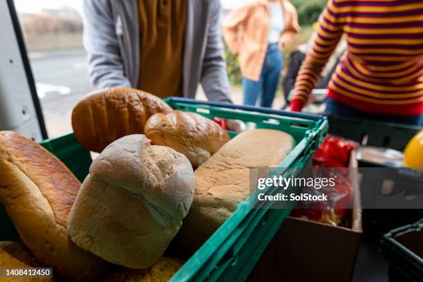 fresh produce delivered to a community - giving back bildbanksfoton och bilder