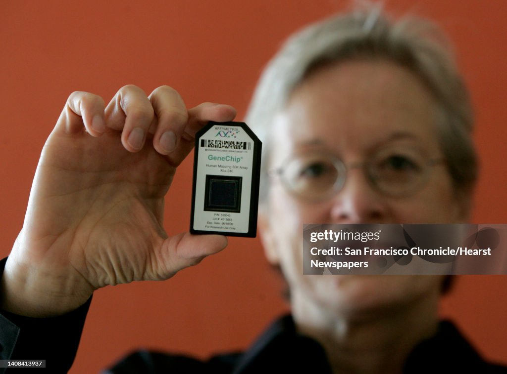 Dr. Janet Warrington, a vice president of Affymetrix, holds a DNA micro array chip in Santa Clara, Calif. on Friday, September 8, 2006. The biotechnology firm manufactures the GeneChip micro array which analyzes DNA composition. A study commissioned by t