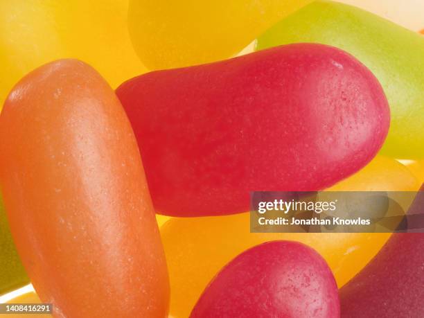 extreme close up vibrant jelly beans - boiled sweet stock pictures, royalty-free photos & images