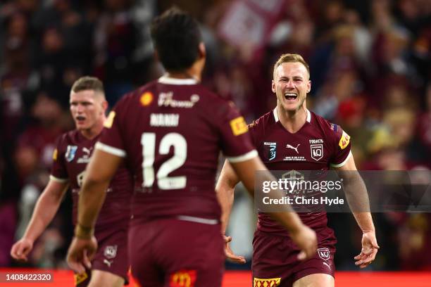 Daly Cherry-Evans of the Maroons celebrates with team mates after winning game three of the State of Origin Series between the Queensland Maroons and...