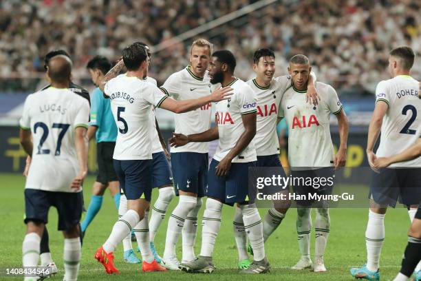 Harry Kane of Tottenham Hotspur celebrates with team mate after scores the fifth goal during the preseason friendly match between Tottenham Hotspur...