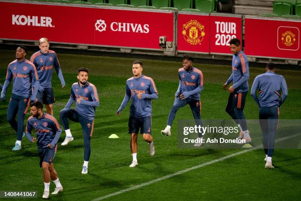 Alex Telles, Diogo Dalot, Fred of Manchester United in action during a Manchester United Pre-Season Training Session at AAMI Park on July 13, 2022 in...