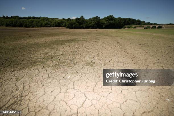 The drying out bed and receded water levels at Lindley Wood Reservoir on July 13, 2022 in Otley, England. A spokesman for Yorkshire Water, the...