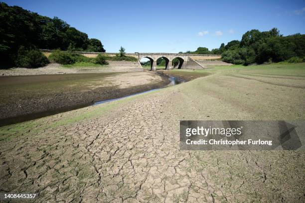 The drying out bed and receded water levels at Lindley Wood Reservoir on July 13, 2022 in Otley, England. A spokesman for Yorkshire Water, the...