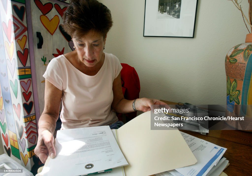 Fran Quittel reviews documents related to her savings and checking accounts at IndyMac Bank in Emeryville, Calif., on Friday, Sept. 26, 2008. Quittel was among the many account holders that had to recover their money through the FDIC after IndyMac folded