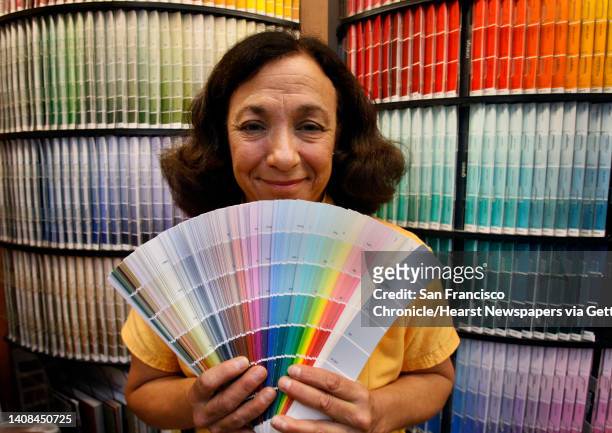 Color consultant Laury Rosenthal displays paint samples at Fregosi paint store in San Francisco, Calif., on Wednesday, Nov. 26, 2008.