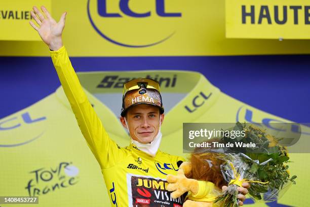 Jonas Vingegaard Rasmussen of Denmark and Team Jumbo - Visma celebrates at podium as Yellow Leader Jersey winner during the 109th Tour de France...
