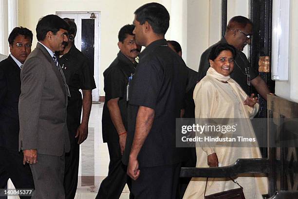 Uttar Pradesh Chief Minister Mayawati arrives at Governor Banwari Lal Joshi's residence to submit her resignation on March 7, 2012 in Lucknow, India....