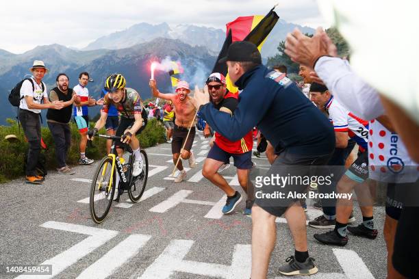Jonas Vingegaard Rasmussen of Denmark and Team Jumbo - Visma competes in the breakaway at the Col du Granon while fans cheer during the 109th Tour de...
