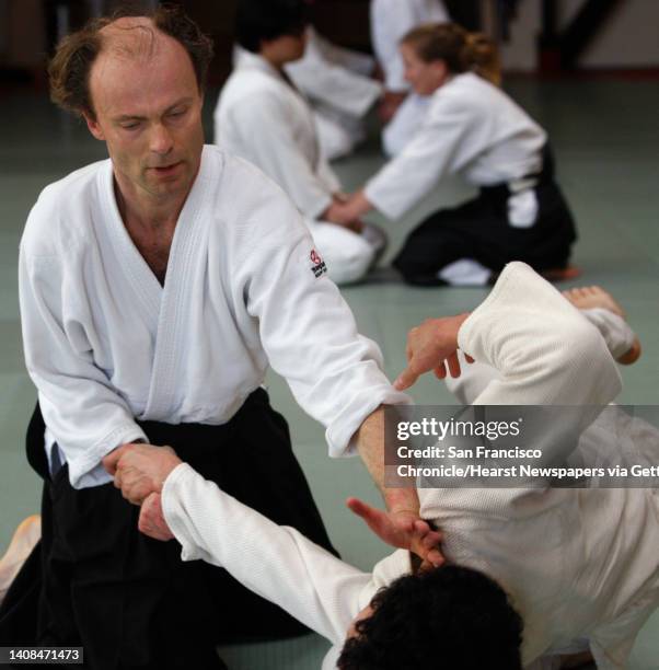 Ragnar Bohlin , chorus director for the San Francisco Symphony, practices akido with Jonathan Wong at the Suginami Aikikai dojo in San Francisco,...