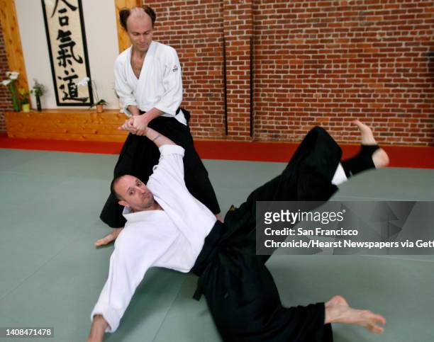 Ragnar Bohlin , chorus director for the San Francisco Symphony, practices akido with his instructor Vajra Granelli at the Suginami Aikikai dojo in...