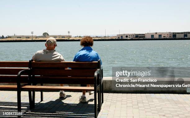 Earl and Annita Paul, tourists from Little Rock, Arkansas, enjoy the breeze at Jack London Square in Oakland, Calif. On Monday July 12, 2010.