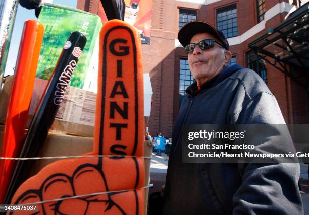 Souvenir vendor Monty Kessler sells his wares in Willie Mays Plaza before the San Francisco Giants game against the Arizona Diamondbacks at AT&T Park...