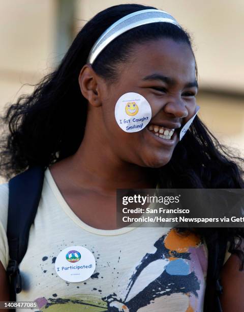 Sixth-grader Tyler Washington attends a Smile Day rally during the lunch break at A.P. Giannini Middle School in San Francisco, Calif., on Thursday,...