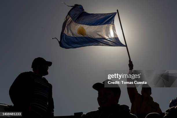 Demonstrator waves an Argentine flag during a national protest against the economic policies taken by Fernandez administration on July 13, 2022 in...