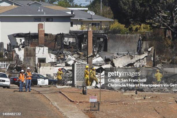 Investigators at the scene in San Bruno, Calif. On Saturday, Sept. 11, 2010 where a natural gas line explosion destroyed more than 35 homes and...