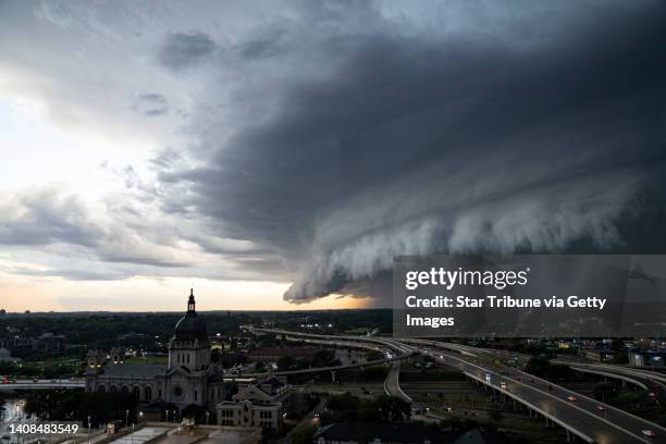Storm clouds roll in Tuesday, July 12, 2022 over the Basilica of Saint Mary in Minneapolis, Minn..
