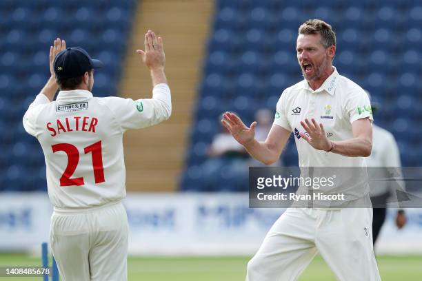 Michael Hogan of Glamorgan celebrates after bowling out Haseeb Hameed of Nottinghamshire during the LV= Insurance County Championship match between...