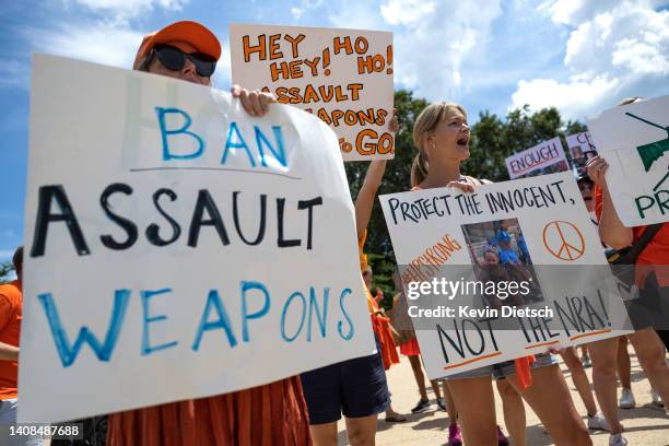 Gun control activists rally near the U.S. Capitol calling for a federal ban on assault weapons on July 13, 2022 in Washington, DC. Friends, family...