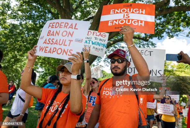 Felix and Kimberly Rubio who lost their daughter Lexi in the Uvalde, Texas school shooting march in a rally calling for a federal ban on assault...