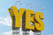 Yellow Yes Billboard Sign with Spot Lights