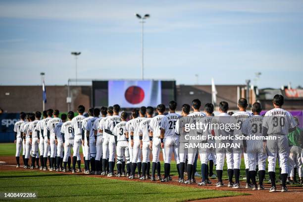 Players of Japan during their national anthem prior to the Netherlands v Japan game during the Honkbal Week Haarlem at the Pim Mulier Stadion on July...